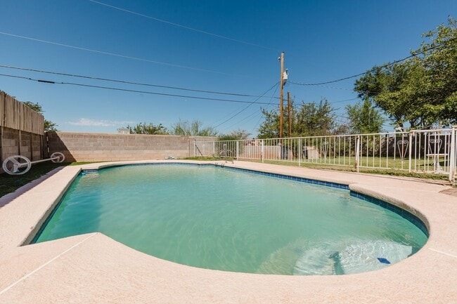 Building Photo - Spacious 3 Bedroom Home with Solar Panels and a Pool