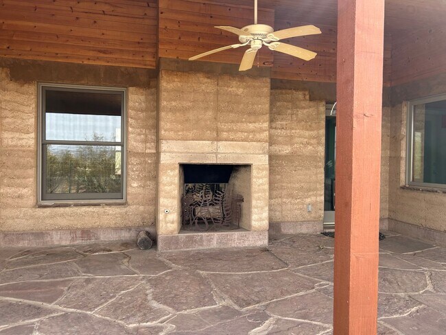 Building Photo - Desert Home on 3.3 Acres with Rooftop Views & Unique Rammed Earth Design