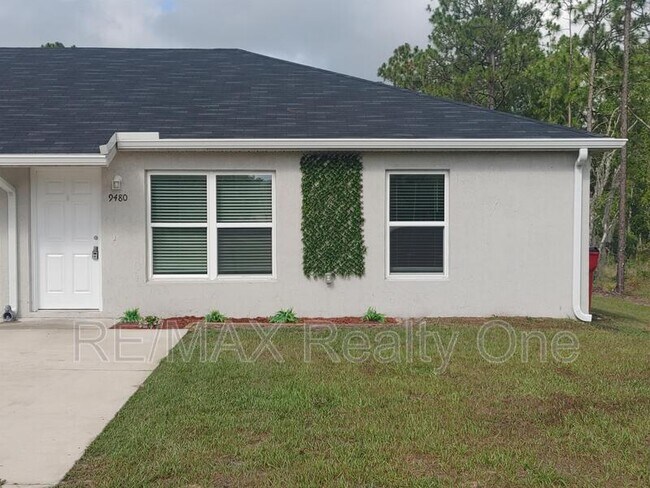 Building Photo - 9480 N Travis Dr
