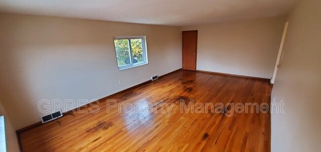 Building Photo - 5706-5708 Poketa Rd.