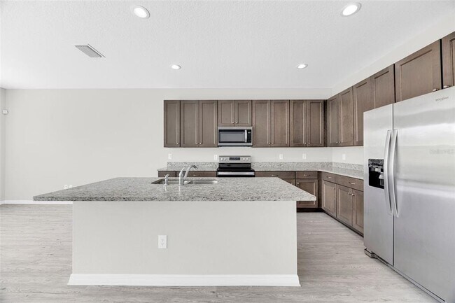 Building Photo - 6321 Tillandsia Pl