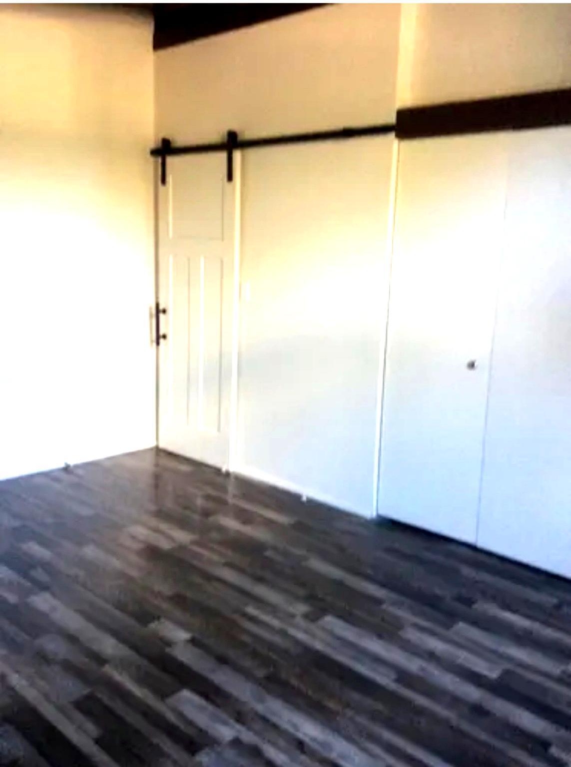 Rest of Large Closet with View of Closed Slider Barn Door - 506 122nd St S