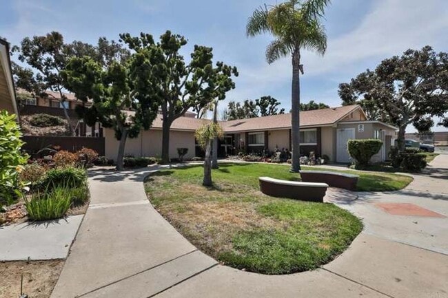 Building Photo - Coming in June......Sunny & Spacious 3BR Condo – Minutes from the Beach