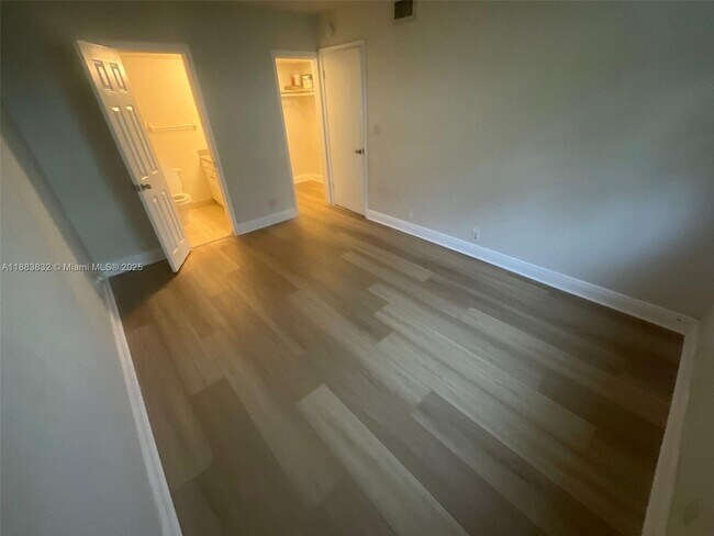 Building Photo - 3090 Coral Springs Dr