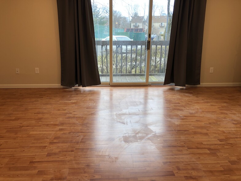 Partial View of Living Room and Deck - 13 Presidential Dr