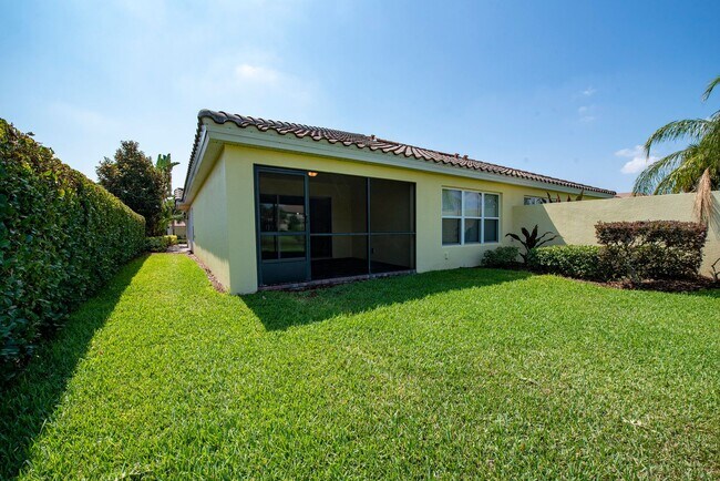 Building Photo - Deluxe Villa Lake view all Tile. 3 Bedrooms+2 Baths