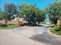 Building Photo - 2 Bedroom 2 bath apt with a POOL! Very close to everything but tucked away.