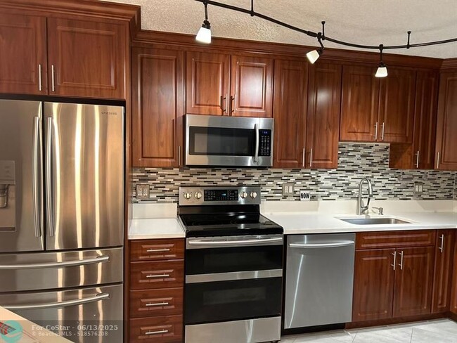Building Photo - 5800 Camino Del Sol