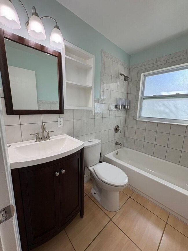 Building Photo - 3 Bedrooms on a fenced back yard and a sough after school zone Lawn Care included