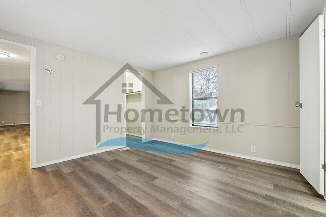 Building Photo - 2-Bedroom 2-Bathroom Home with Off-Street Parking Available in Coeur d’Alene!