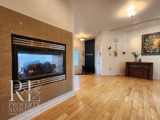 Building Photo - Light-Filled View Home with Vaulted Ceilings & Warm Wood Finishes