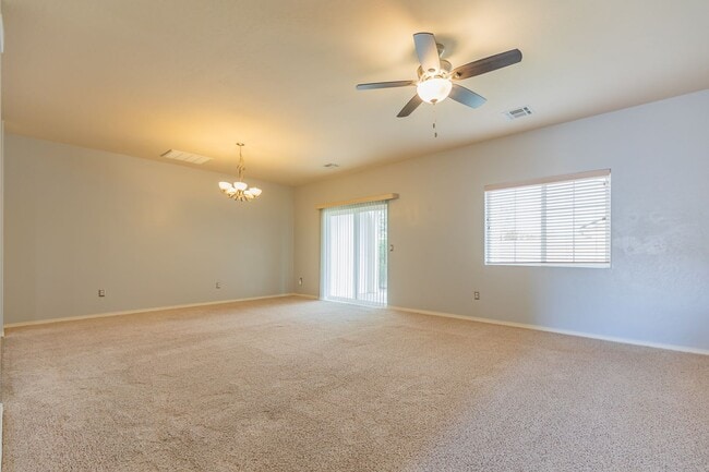 Building Photo - Inviting 4 Bed 2 Bath Home - Solar Panels & In The Golf Course Area!