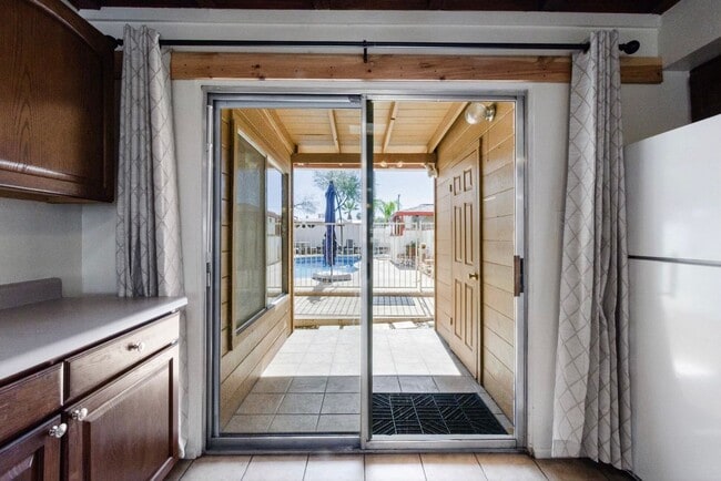 Building Photo - Available March 1, 2026. Updated 2 Bedroom 1.5 Bath Duplex with private dedicated pool.