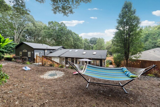 Building Photo - Fully Furnished: Beautiful 4-Bedroom Home ...