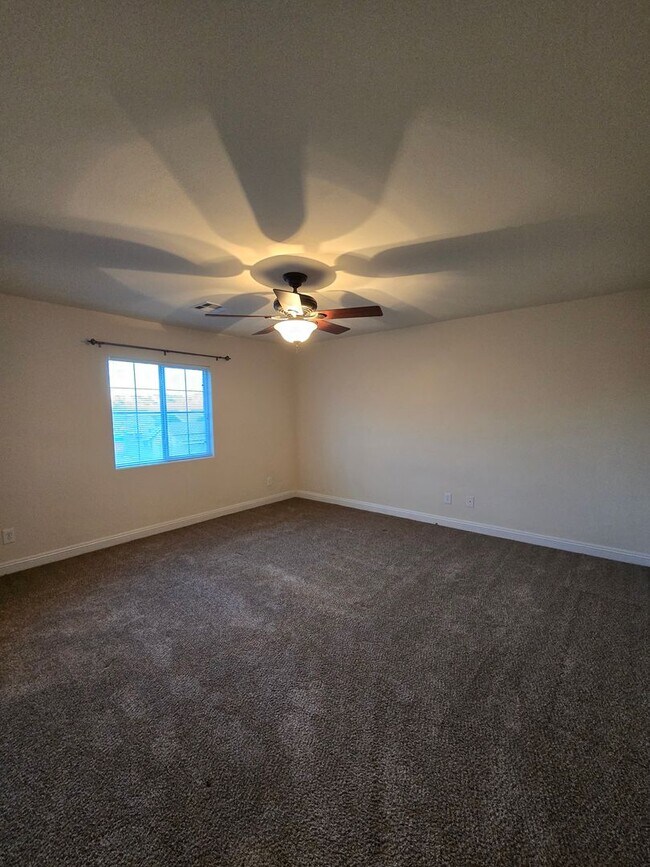 Building Photo - A Fabulous 3 Bedroom, 2.5 Bathroom, 2 Car Garage Townhome in NW Las Vegas