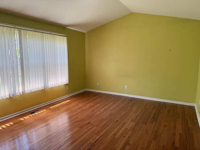 Building Photo - Large 2 Story home with 3 Bedrooms, 2.5 baths, hardwood floors, office and finished basement
