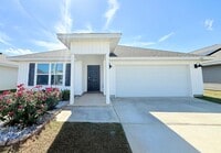 Building Photo - 4-Bedroom Home - Woodlands - Community Splash Pad and Playground
