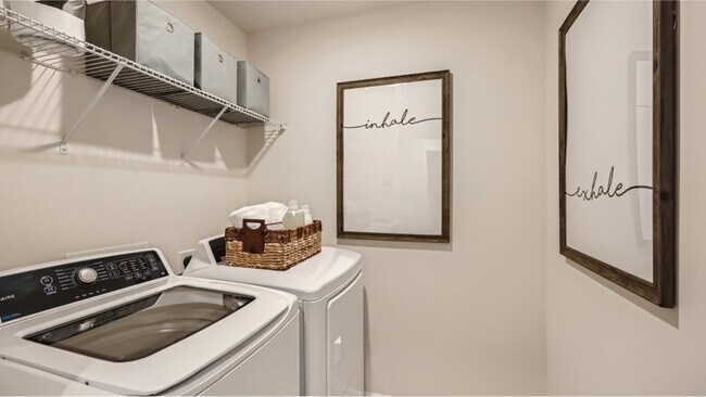2nd floor Laundry: Efficient laundry space: Convenient, organized, where chores become a breeze. - 13119 Cottage Crest Ln