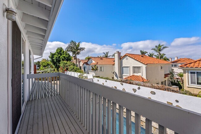 Building Photo - Coastal Elegance Meets Family Comfort in D...