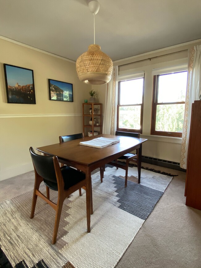 Dining room with lots of light, off the kitchen - 340 NE Beyrl Ter