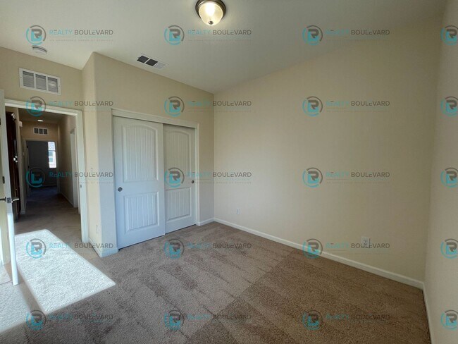 Building Photo - Luxury and Convenience Fully Equipped 3-Bedroom 2.5 Bathroom 2 Car Garage Townhome in Carson City