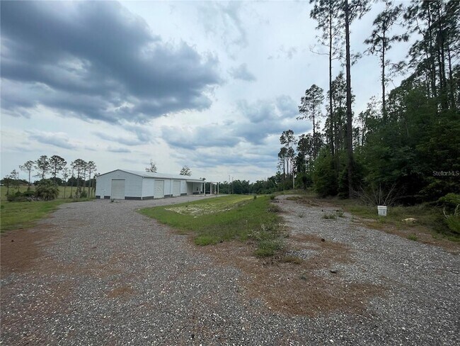Building Photo - 33740 Larkin Rd