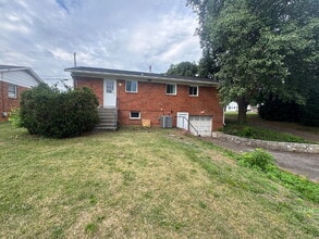 Building Photo - July Only: 1/2 Off First Full Month's Rent, submit your application this month and pay a reduced ...