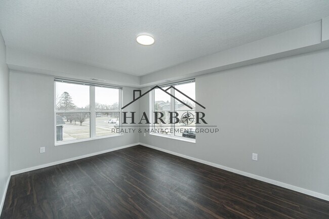 Building Photo - Brand NEW Caroline Apartments 201 -  Move ...