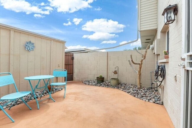 Building Photo - Discover this charming two-story townhome