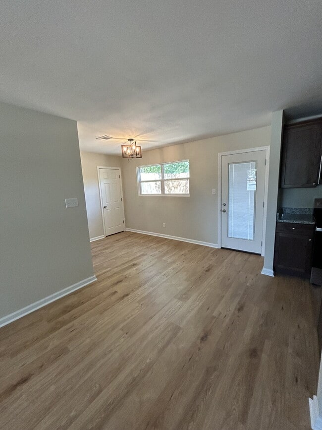 Building Photo - "Charming 4-Bedroom Retreat with Granite T...