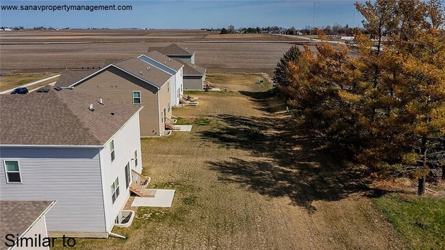 Building Photo - "Ankeny Oasis: Luxurious 4-Bedroom Home with Expansive 3-Car Garage and Secluded Backyard Retreat!"
