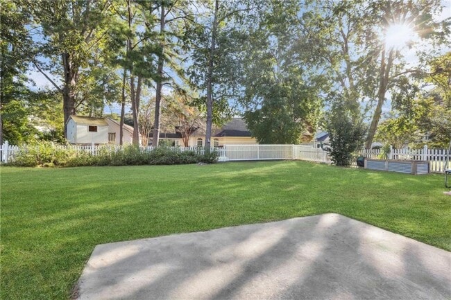Building Photo - 4-Bedroom Home in Wild Heron with Front Porch and Fenced Yard