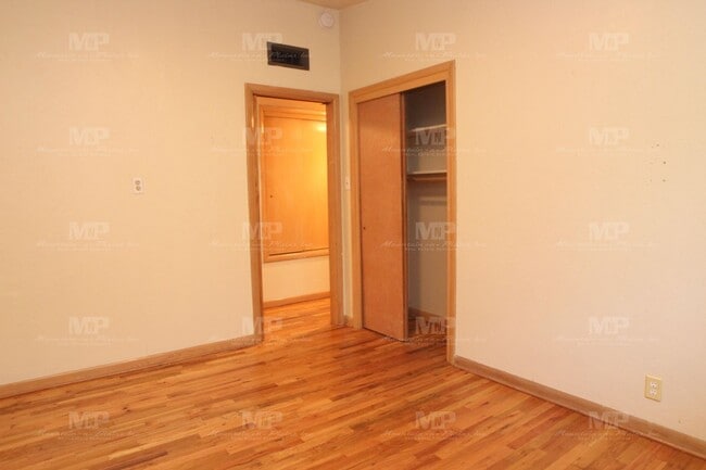 Building Photo - Three Bedroom with Covered Parking Spot!