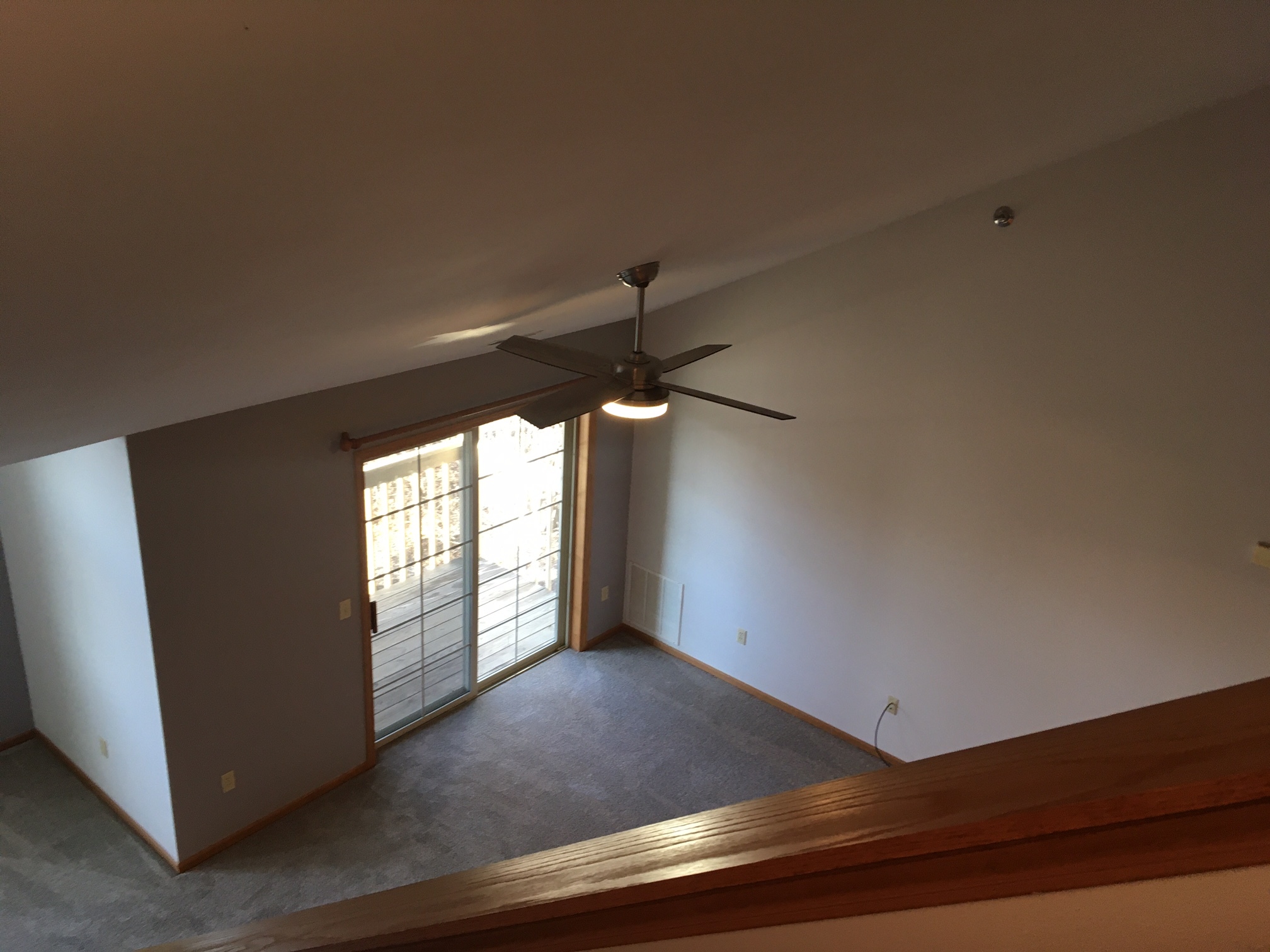 Living room with balcony & patio window - 135 W Oak Leaf Dr