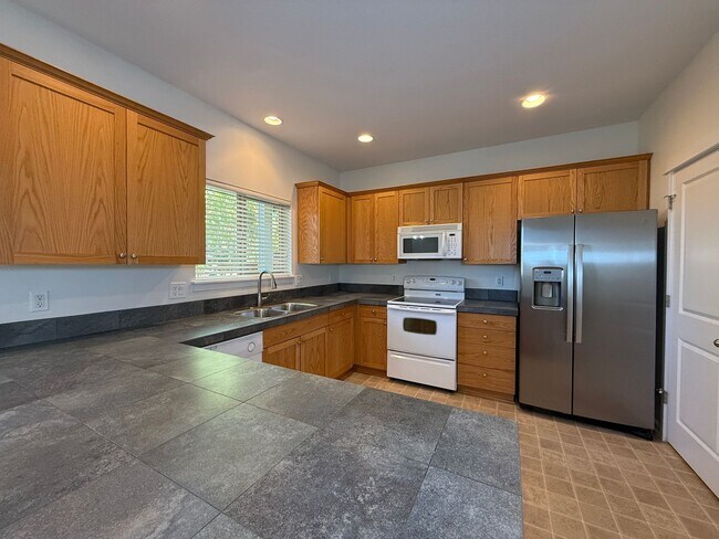 Building Photo - TAKE A LOOK AT THIS GORGEOUS HOME SITTING ...
