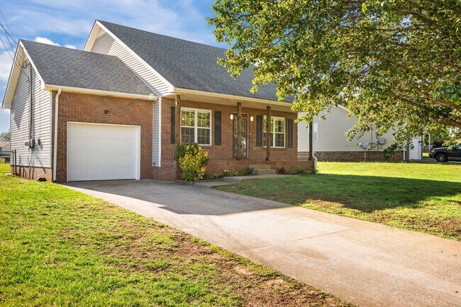 Building Photo - Charming Brick Home with Soaring Ceilings & Updated Finishes!