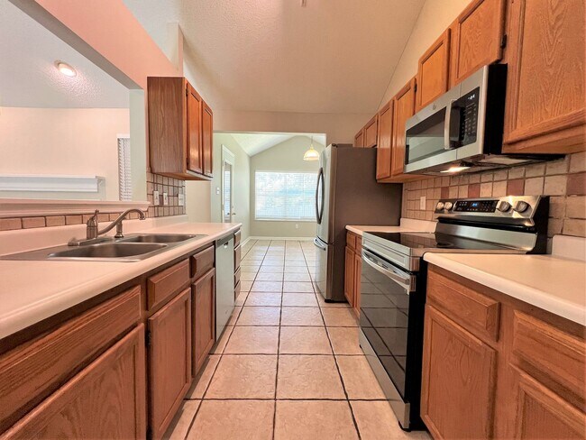 Building Photo - 6017 Tennyson Dr