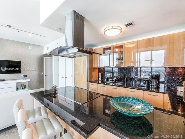 Building Photo - 6899 Collins Ave