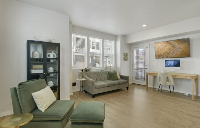 Building Photo - Modern Ground-Level Condo in River Terrace...