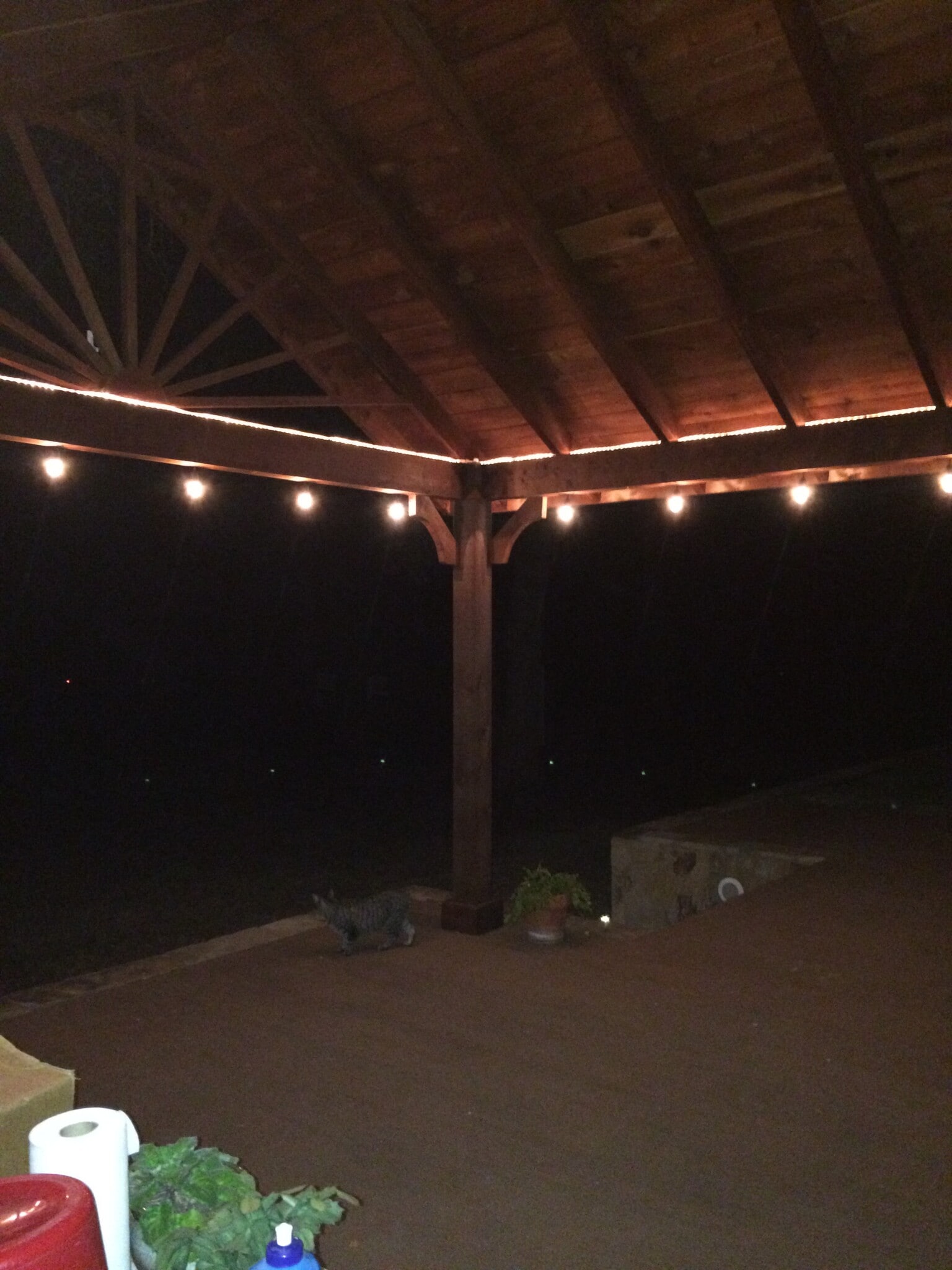 backyard porch w TV , privacy shades and lights - 13372 FM 2710