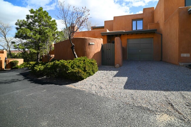 Building Photo - Two Story Condo Just off Old Taos Highway ...