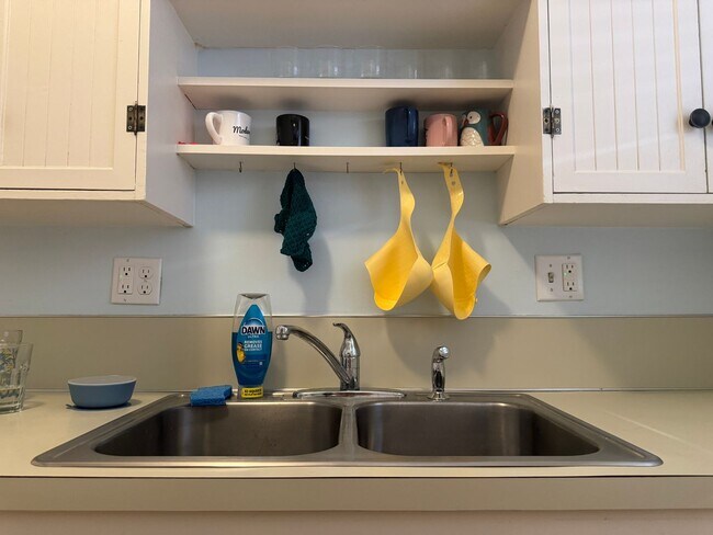 Building Photo - Charming Brick Ranch with Finished Basement & Fenced Yard