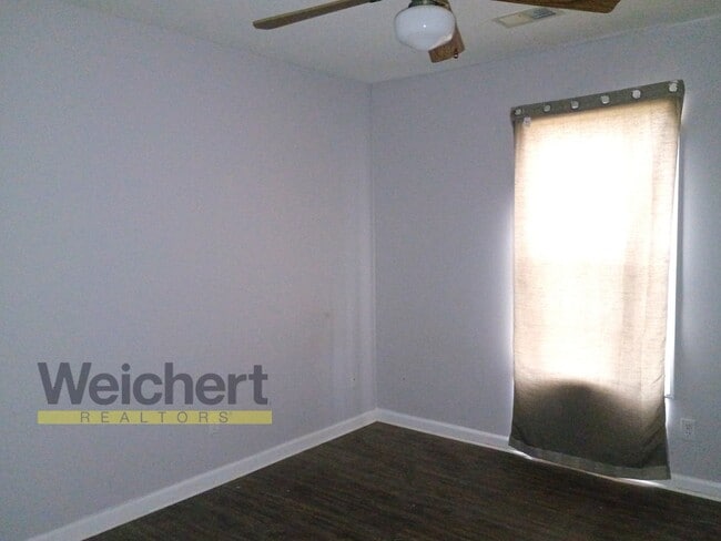 Building Photo - Spacious 3BR/2BA with Carport & Large Yard