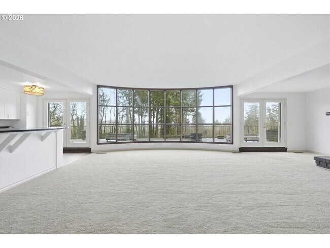 Building Photo - One-of-a-Kind 5BR Home with Floor-to-Ceiling Windows, Wraparound Decks & Breathtaking Treeline Views