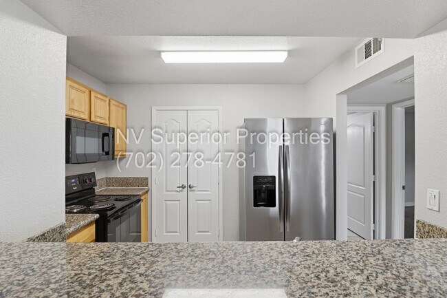 Building Photo - SW!! First floor unit with Balcony!! Gated!! Clubhouse!!  Community pool!! Spa!! Exercise Room!! ...