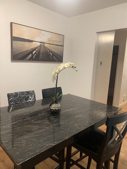 Dining room includes dining room table and 4 chairs - 896 Raymond Dr