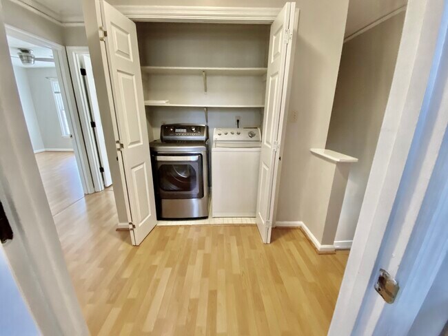 Laundry area located on the top floor. - 2160 Heritage Trace Ln