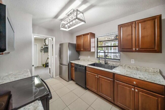 Building Photo - Heated Pool. Premium Upgrades. Fully Renov...