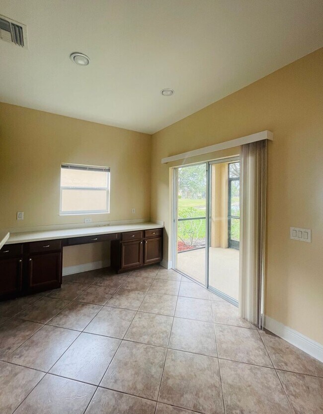 Building Photo - **SUNCOAST LAKES GATED COMMUNITY**