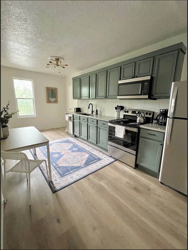 Building Photo - Furnished, Renovated, Urban Living